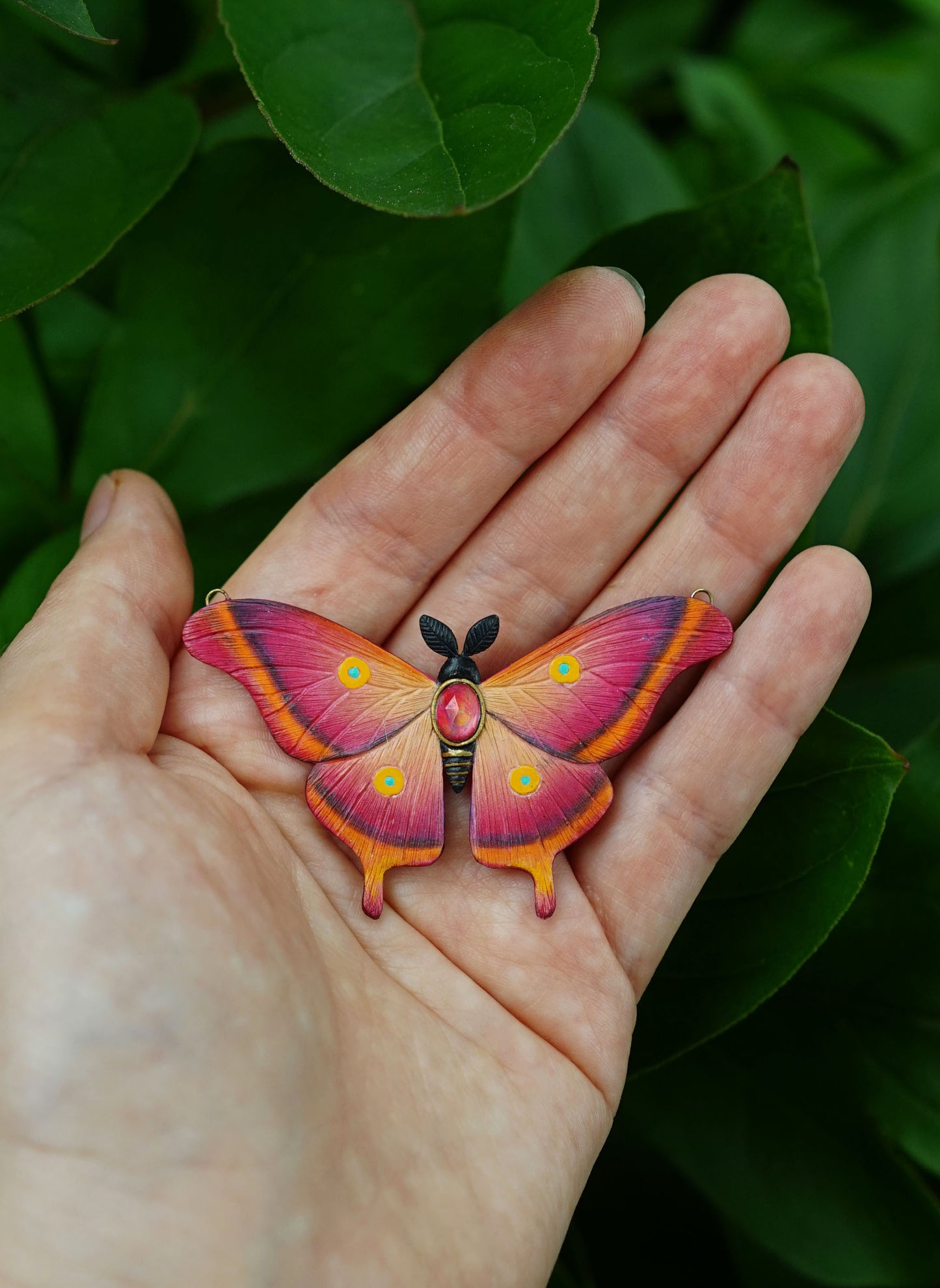 Pink moth pendant
