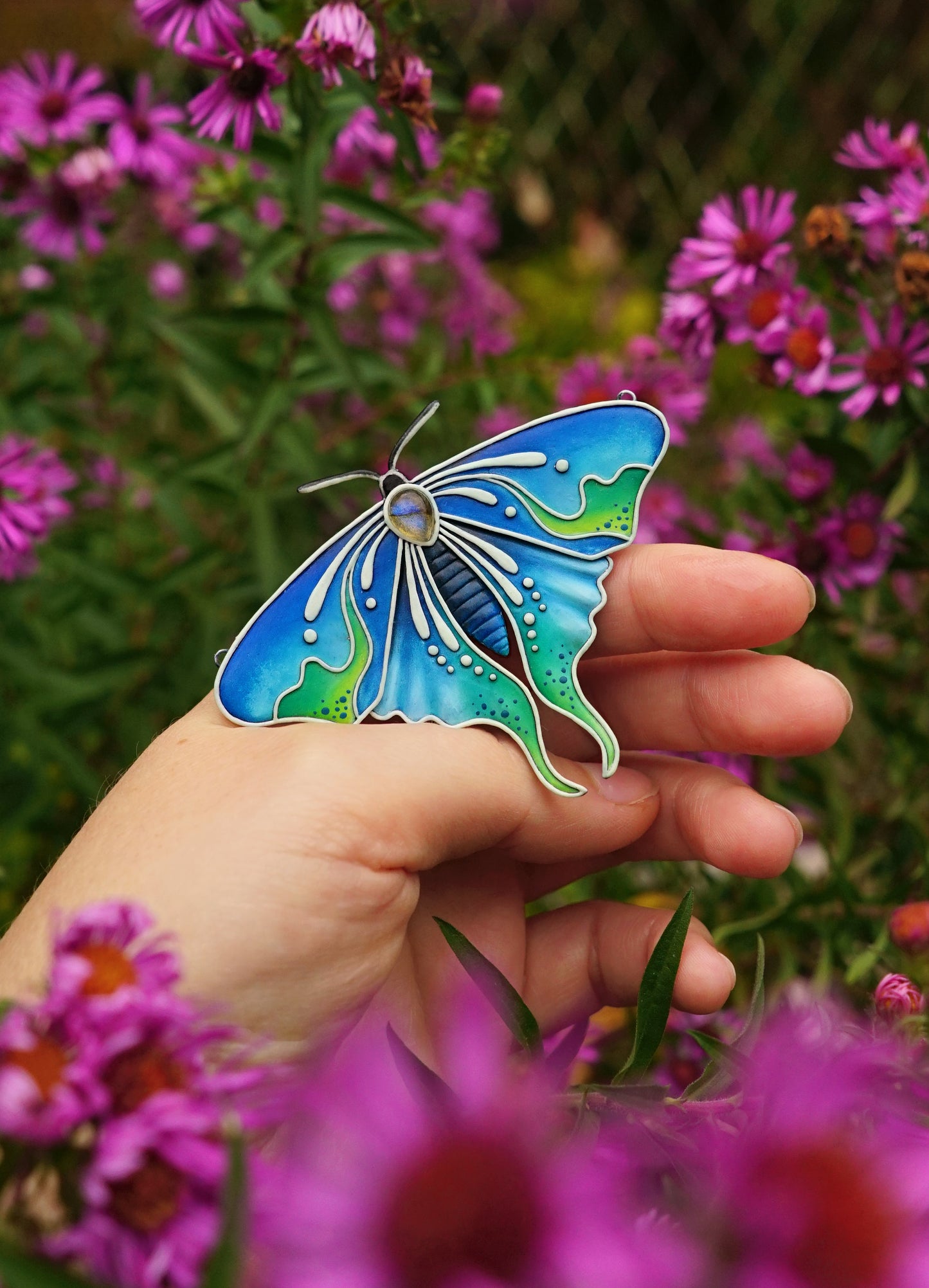 Glow in the dark moth pendant