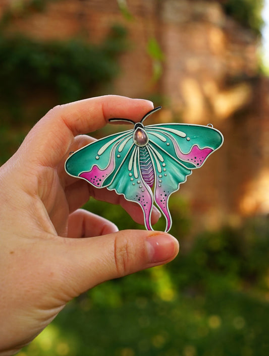 Glow in the dark moth pendant