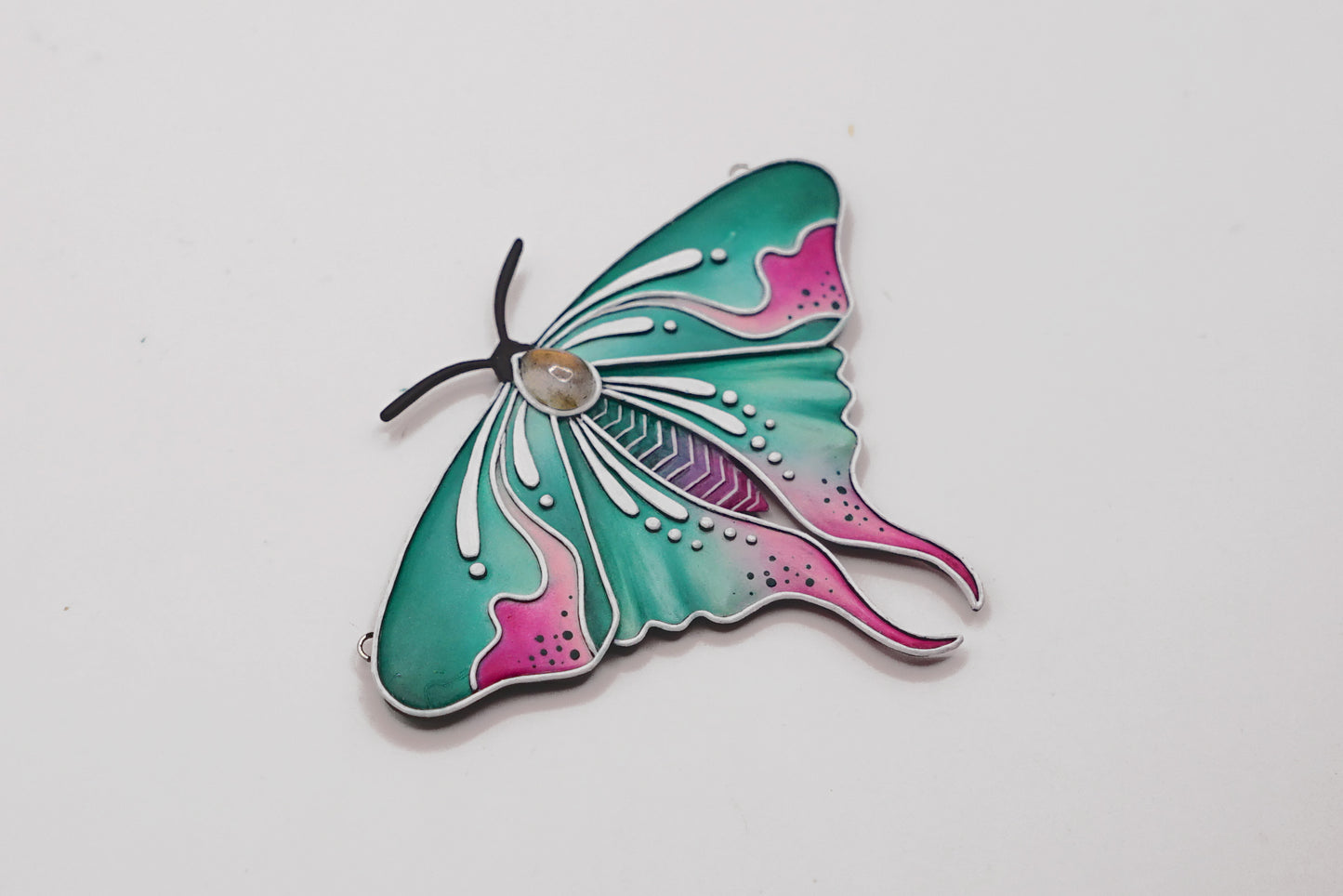 Glow in the dark moth pendant