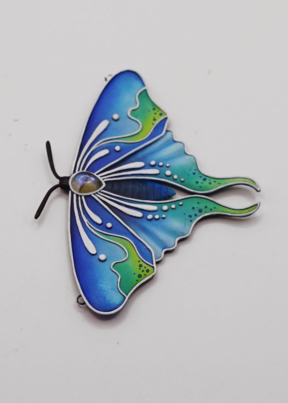 Glow in the dark moth pendant