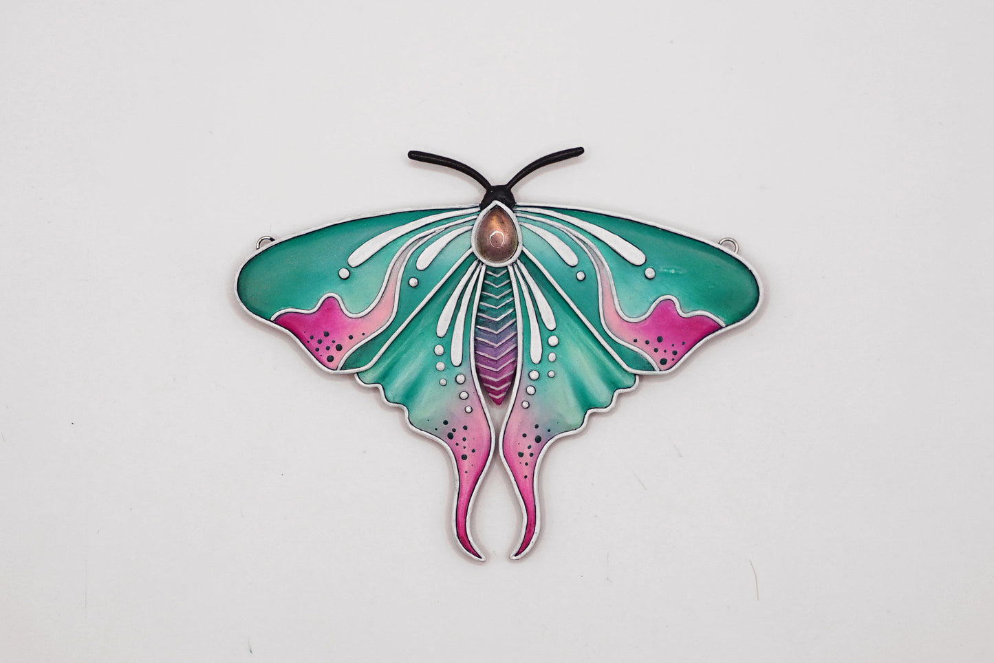 Glow in the dark moth pendant
