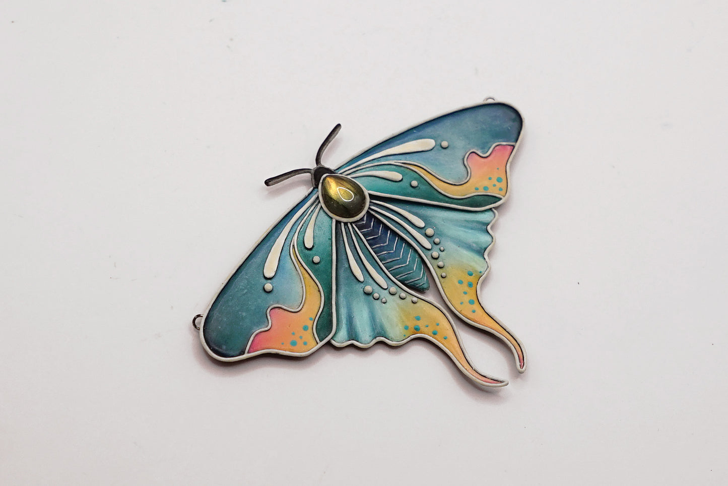 Glow in the dark moth pendant