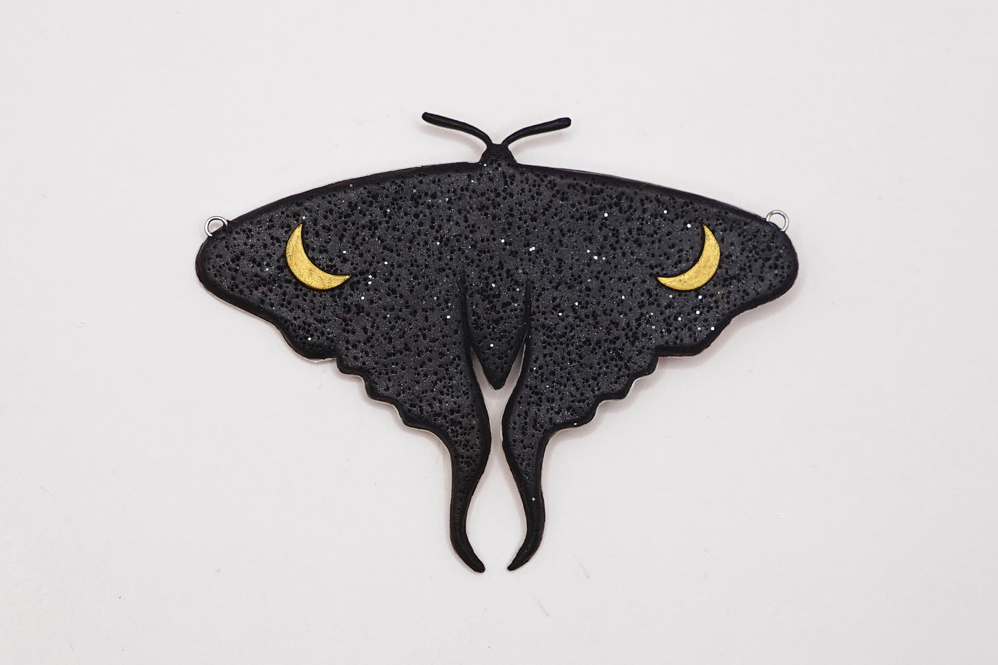 Glow in the dark moth pendant