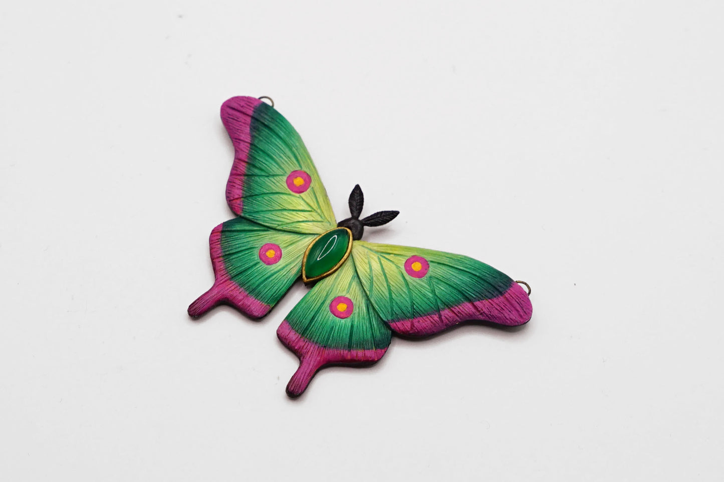 Green moth pendant