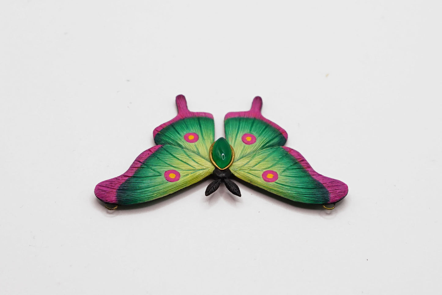Green moth pendant