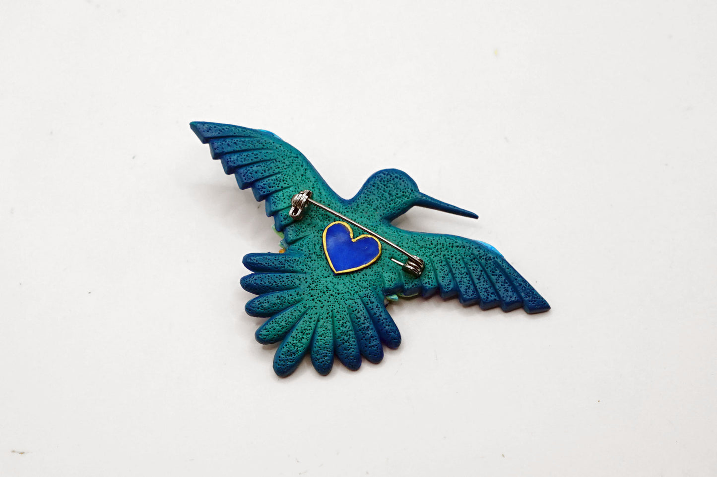 Hummingbird brooch