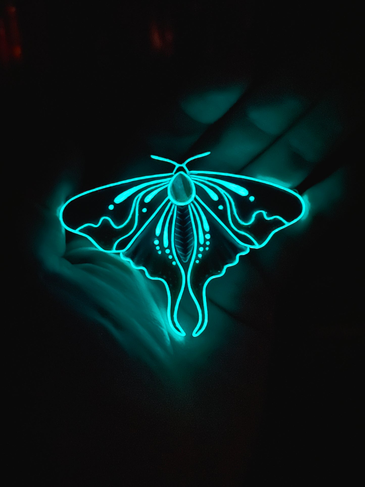 Glow in the dark moth pendant