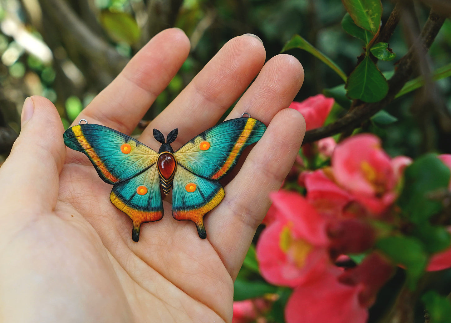 Blue moth pendant
