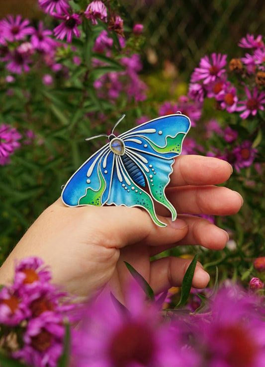 Glow in the dark moth pendant