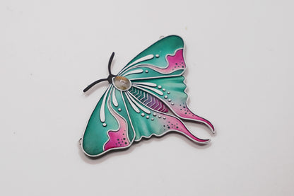 Glow in the dark moth pendant