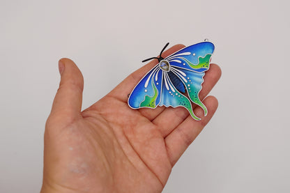 Glow in the dark moth pendant