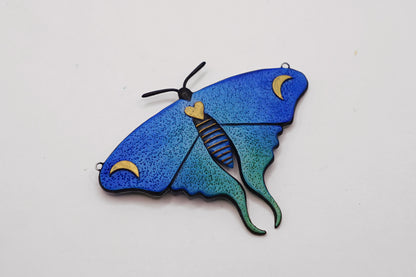 Glow in the dark moth pendant