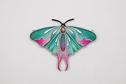 Glow in the dark moth pendant