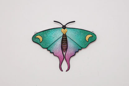Glow in the dark moth pendant