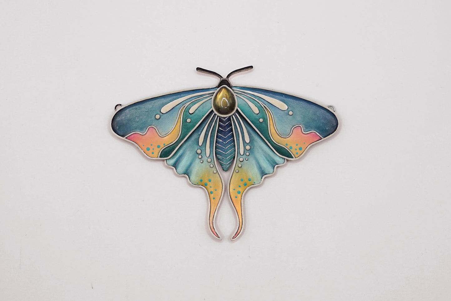 Glow in the dark moth pendant