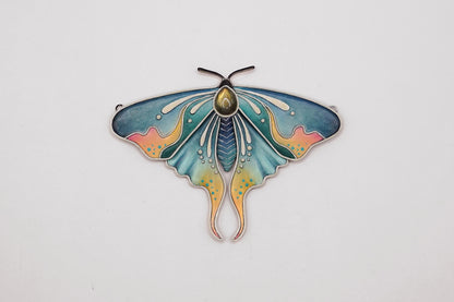 Glow in the dark moth pendant
