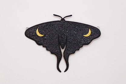 Glow in the dark moth pendant