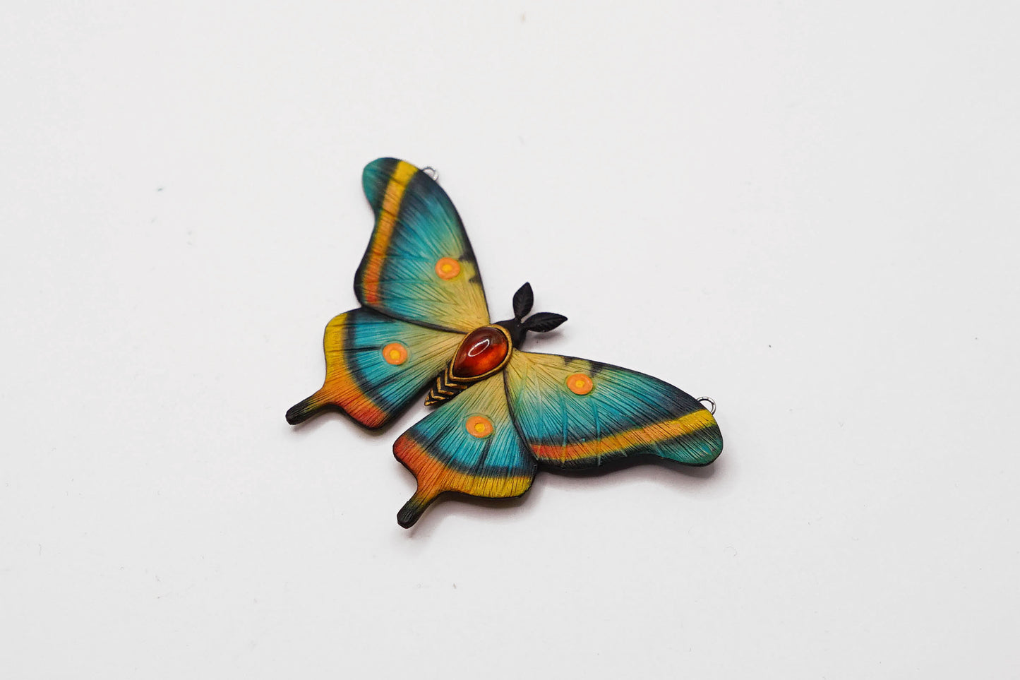 Blue moth pendant