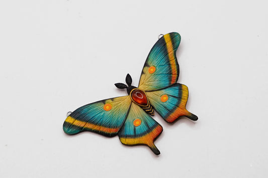 Blue moth pendant