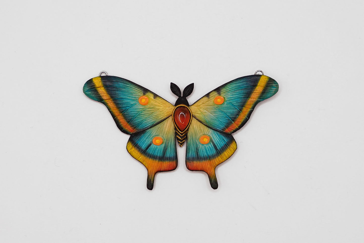 Blue moth pendant