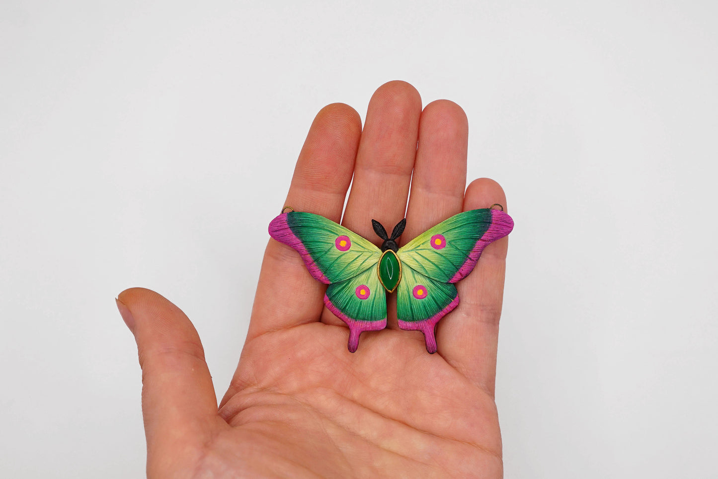 Green moth pendant