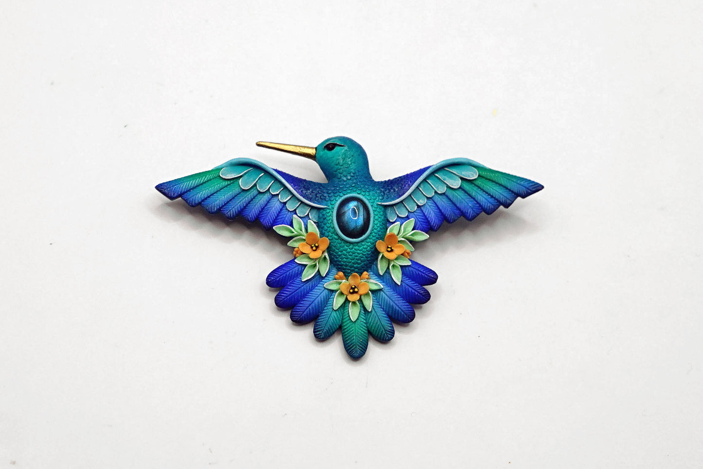 Hummingbird brooch