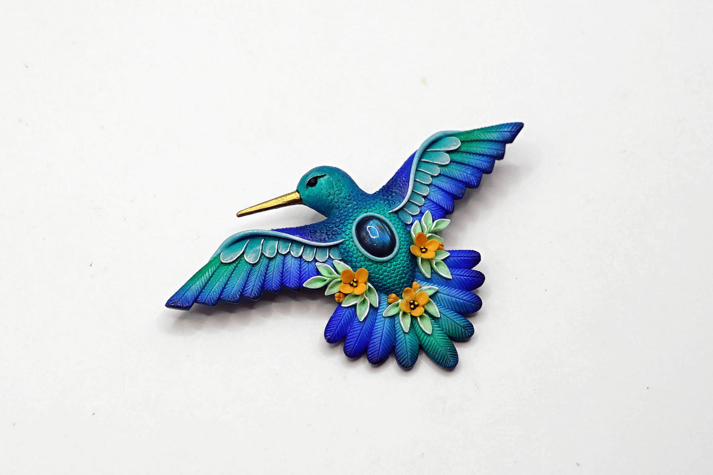 Hummingbird brooch