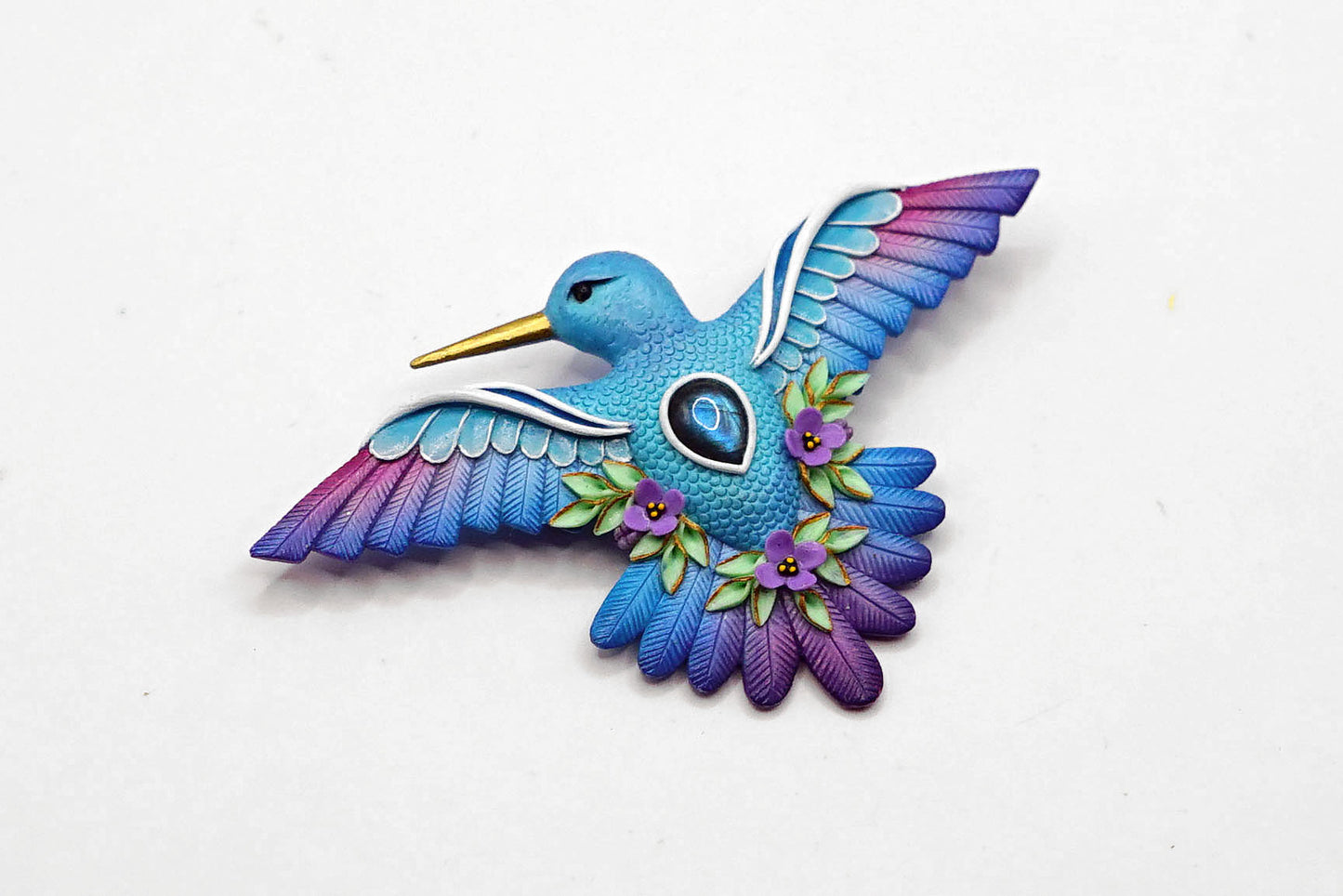 Hummingbird brooch
