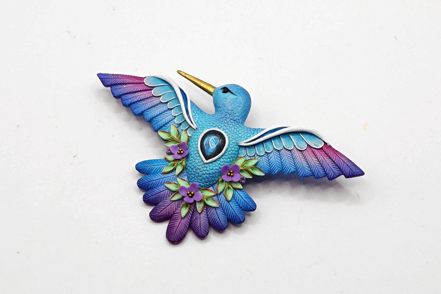 Hummingbird brooch